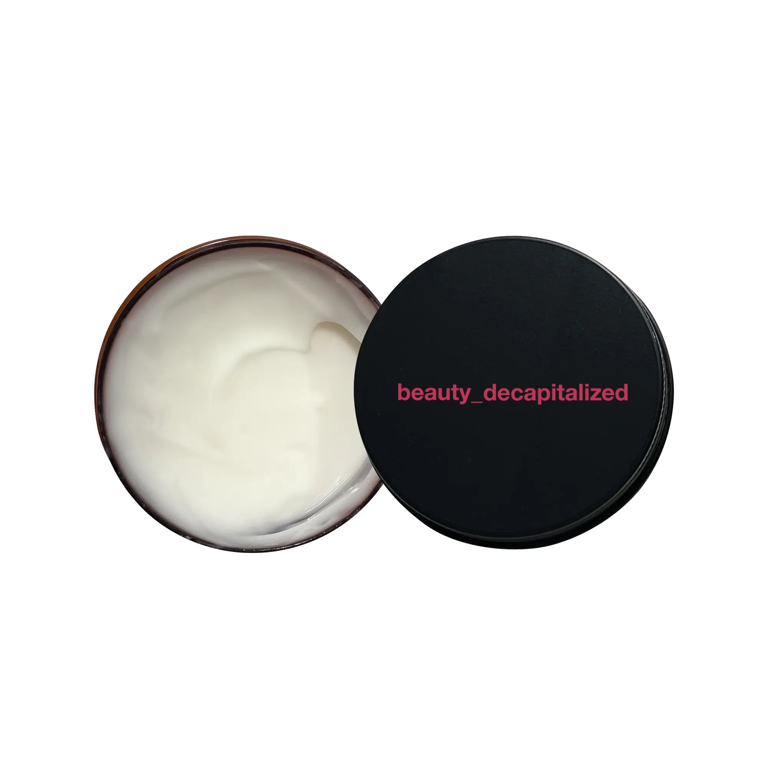 jar of under-eye cream with "beauty_decapitalized" printed on the lid